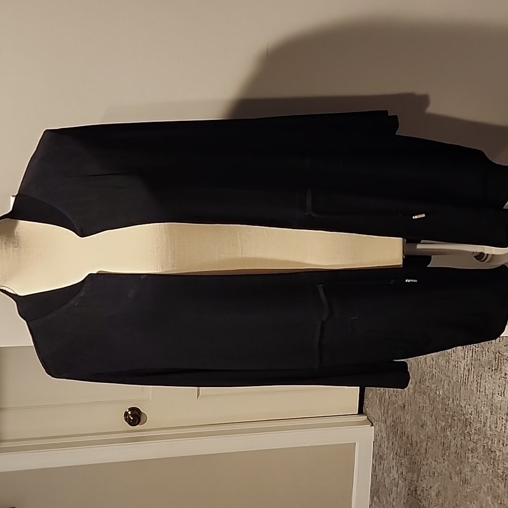 Chico's travelers black cardigan with tie waist size 12/14 length is 32 inches.